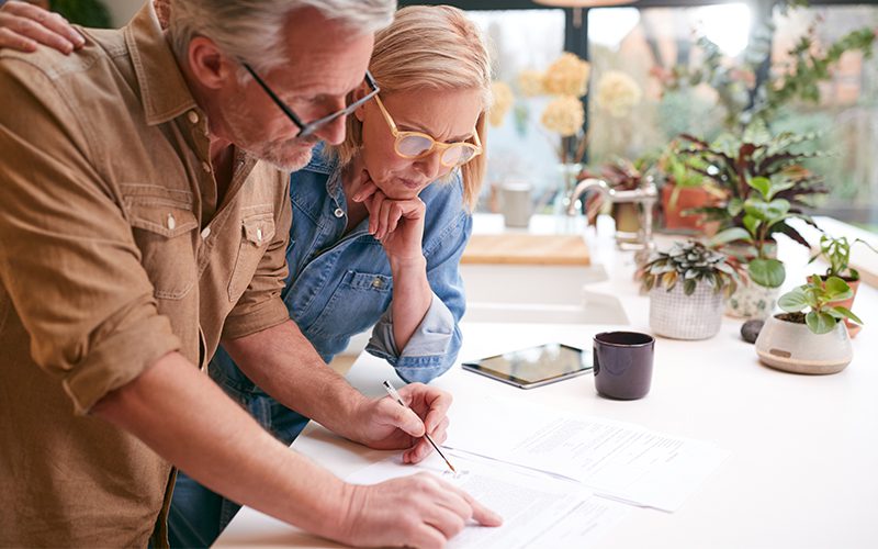 couple-insurance-policy Saving Money On Insurance